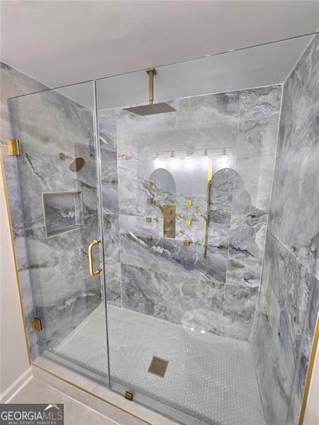 bathroom featuring a stall shower