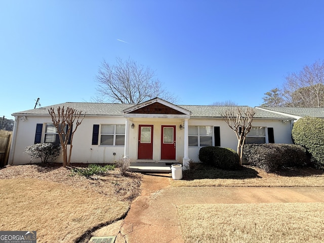 ranch-style home with stucco siding