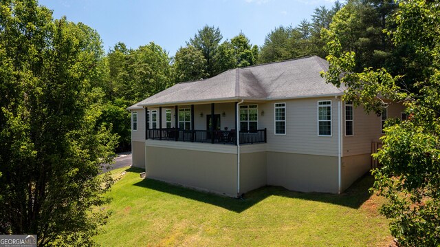 2656 Panorama Dr, Sautee Nacoochee, GA 30571 - view of front facade featuring a front yard and roof with shingles