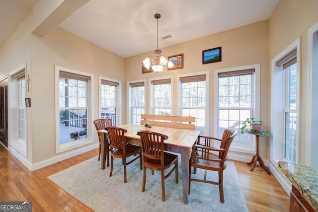 2656 Panorama Dr, Sautee Nacoochee, GA 30571 - dining room with light wood finished floors, baseboards, and a chandelier