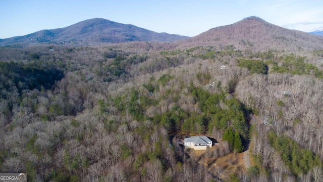 mountain view featuring a forest view