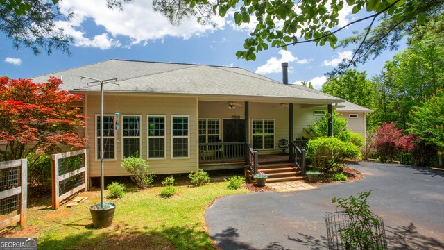 2656 Panorama Dr, Sautee Nacoochee, GA 30571 - back of house featuring ceiling fan, asphalt driveway, and a yard