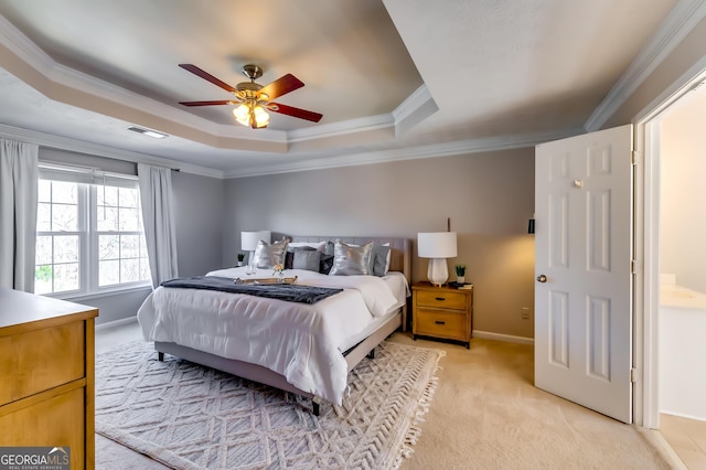 bedroom with light carpet, baseboards, visible vents, a raised ceiling, and crown molding