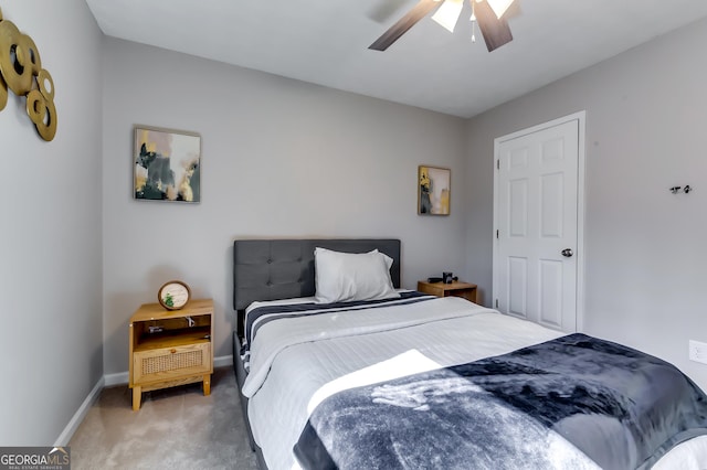 bedroom featuring carpet flooring, a ceiling fan, and baseboards