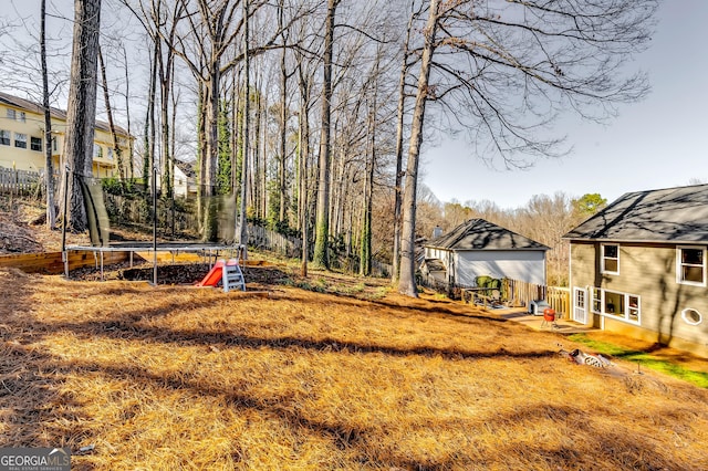 view of yard with a trampoline