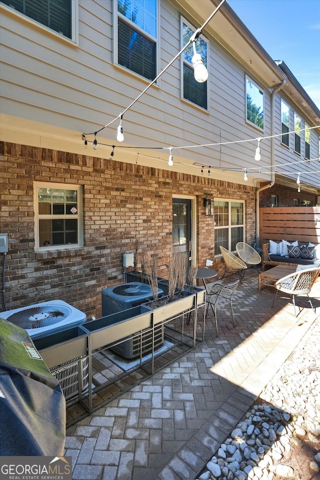 view of patio with cooling unit