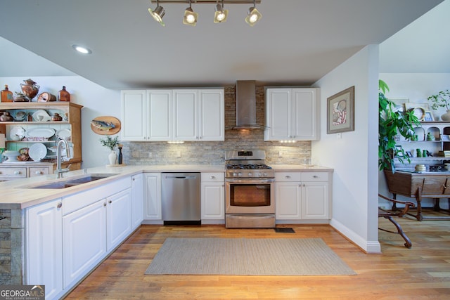 210 Wrights Mill Way, Canton, GA 30115 - kitchen with stainless steel appliances, wall chimney exhaust hood, a sink, light countertops, and backsplash