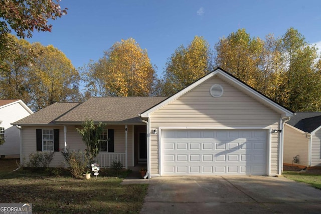 ranch-style house with concrete driveway, a front lawn, roof with shingles, and an attached garage