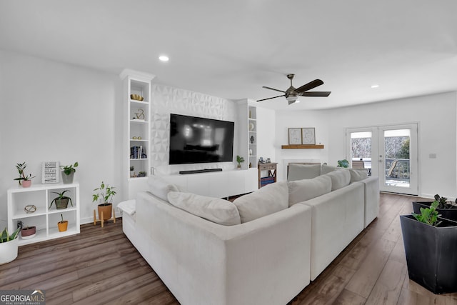 living area with french doors, recessed lighting, a ceiling fan, wood finished floors, and baseboards