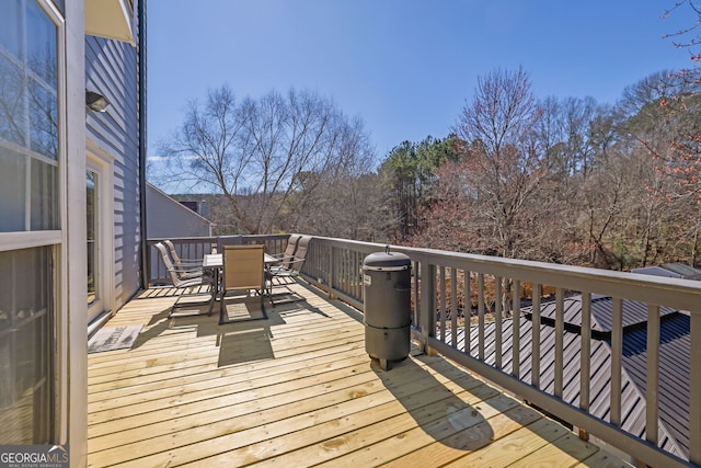 deck featuring outdoor dining space