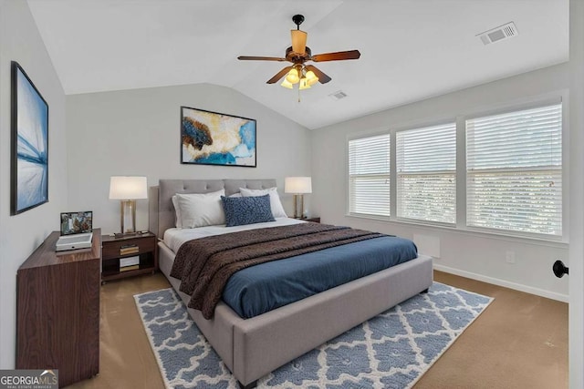 bedroom with lofted ceiling, baseboards, visible vents, and a ceiling fan