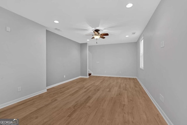 unfurnished room featuring visible vents, baseboards, ceiling fan, light wood-style flooring, and recessed lighting