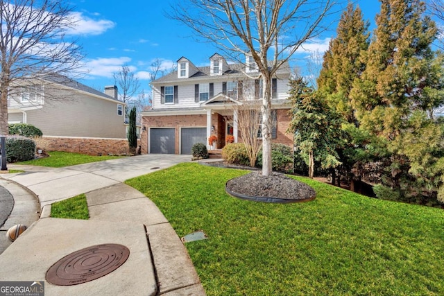 view of front facade with driveway, a garage, a front lawn, and brick siding