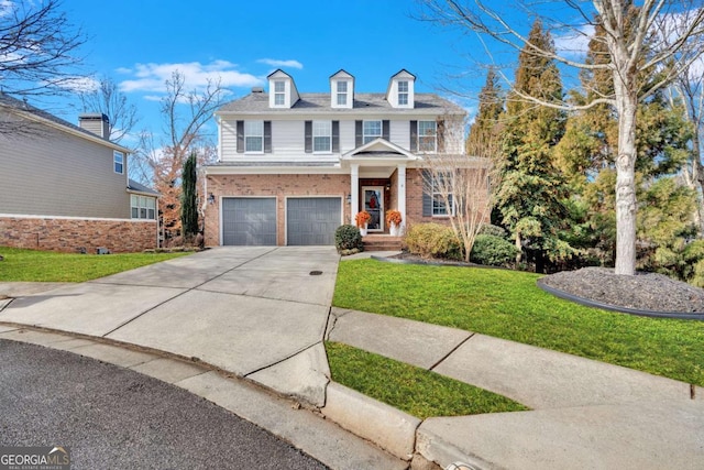 view of front of home featuring a garage, brick siding, driveway, and a front lawn