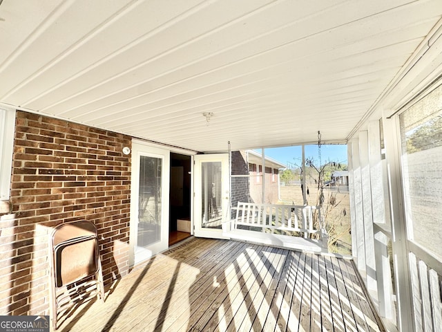 wooden terrace featuring heating unit