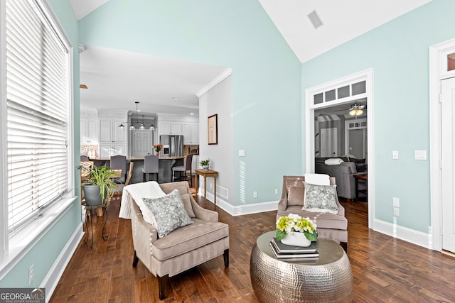 living area featuring high vaulted ceiling, dark wood-style flooring, visible vents, and baseboards