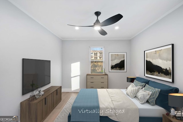 bedroom featuring a ceiling fan, crown molding, recessed lighting, and light wood-type flooring