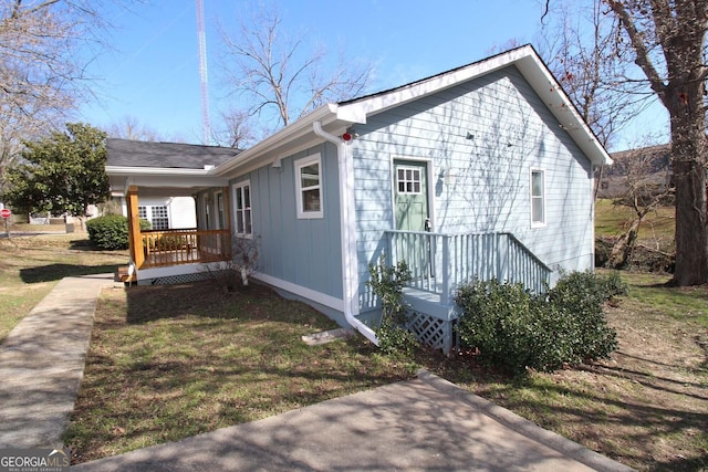 view of home's exterior with a porch