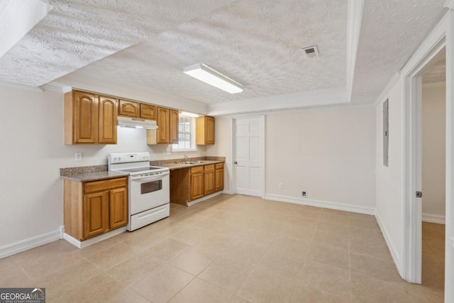 kitchen with white range with electric stovetop, brown cabinets, under cabinet range hood, and a textured ceiling