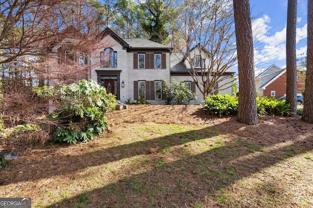 view of front of home featuring brick siding