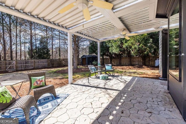 view of patio / terrace featuring a ceiling fan and a fenced backyard