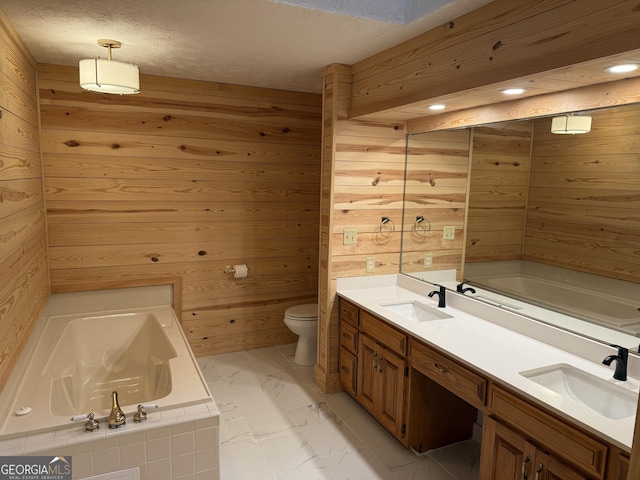 full bathroom with wood walls and a sink