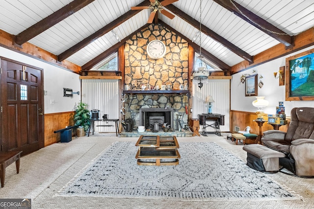 82 Swan Ave, Newnan, GA 30263 - living room featuring wainscoting, carpet, a ceiling fan, wooden walls, and beamed ceiling