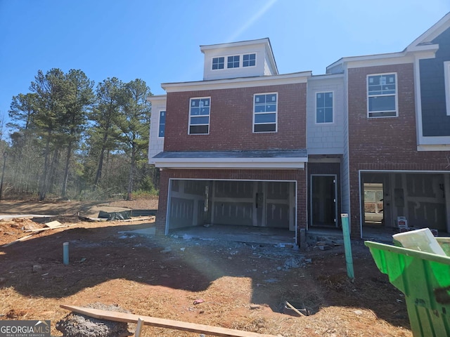 view of front of house featuring driveway and an attached garage