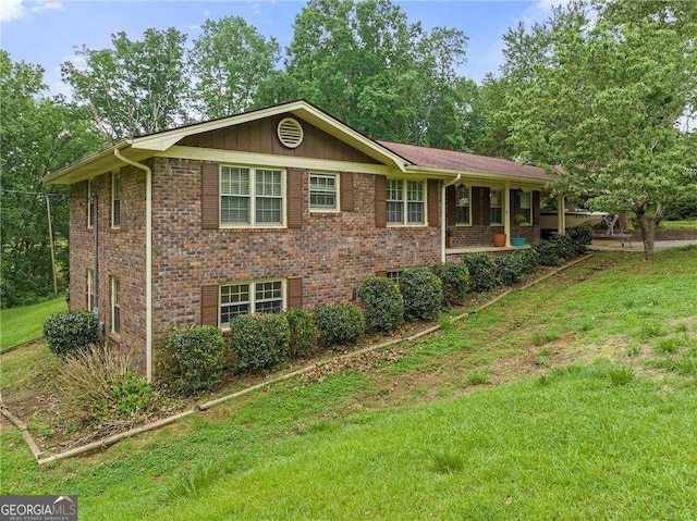 view of property exterior with a lawn and brick siding