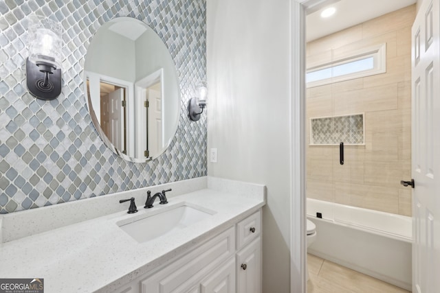 full bathroom featuring vanity, shower / bathing tub combination, and toilet