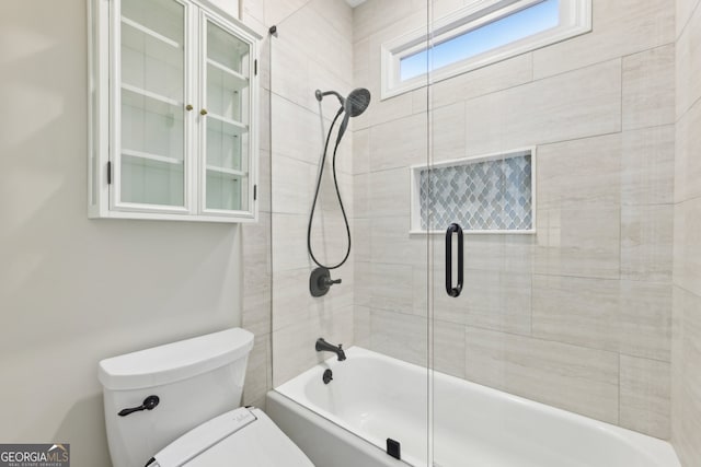 full bath featuring toilet and enclosed tub / shower combo