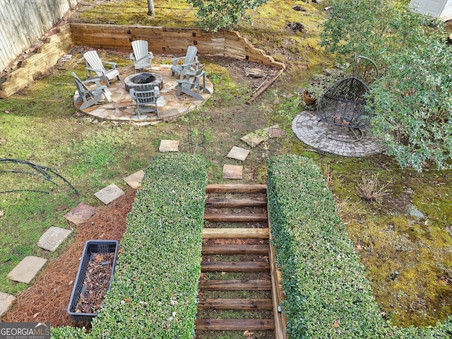 view of yard with a patio and a fire pit