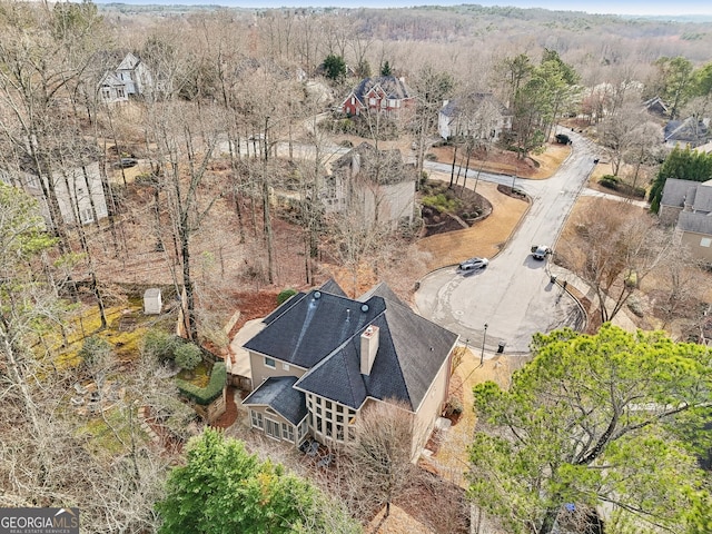 bird's eye view with a forest view