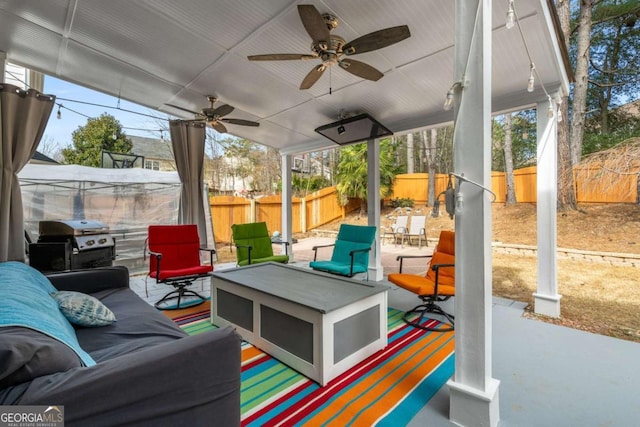 view of patio / terrace featuring ceiling fan, a grill, an outdoor hangout area, and a fenced backyard