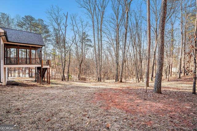 view of yard with a deck