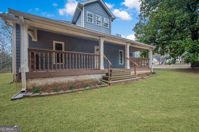 2820 Maxwell Pl, Lithia Springs, GA 30122 - view of front facade with covered porch and a front yard