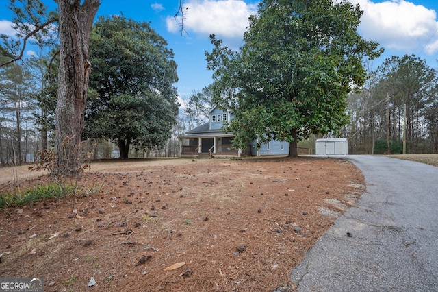 2820 Maxwell Pl, Lithia Springs, GA 30122 - view of front of property with aphalt driveway and a porch