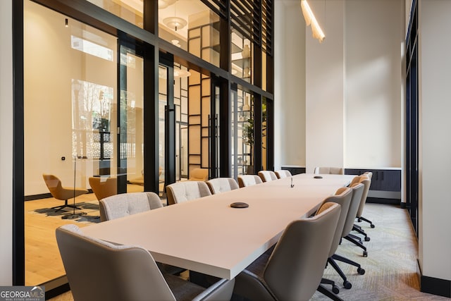 2425 Peachtree Rd NE Unit 903, Atlanta, GA 30305 - interior space featuring wood finished floors and a towering ceiling