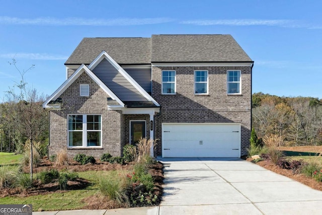 view of front of property featuring an attached garage, a shingled roof, concrete driveway, and brick siding