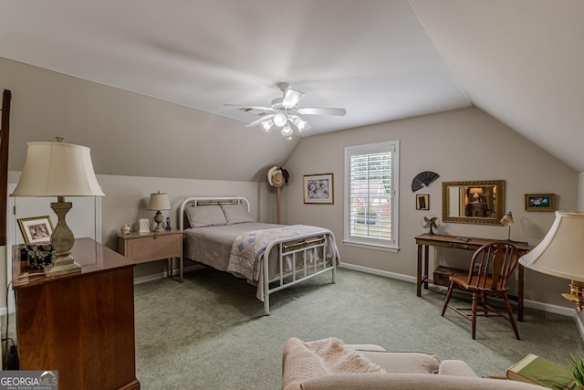 bedroom with lofted ceiling, carpet, baseboards, and ceiling fan