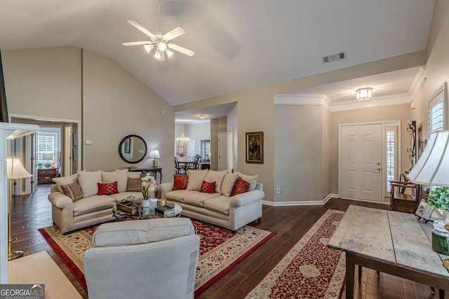 living room with dark wood-style floors, high vaulted ceiling, visible vents, and a healthy amount of sunlight