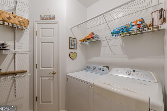 laundry area with laundry area and independent washer and dryer