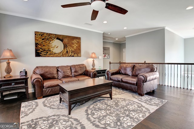 living area featuring ornamental molding, recessed lighting, visible vents, and hardwood / wood-style flooring