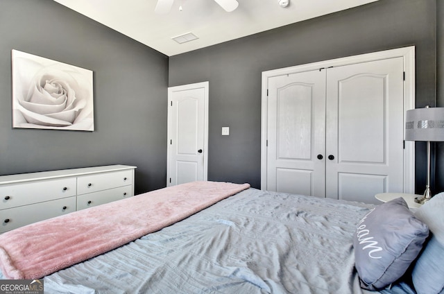 bedroom featuring a closet and a ceiling fan