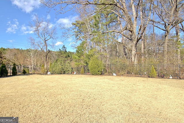 view of yard featuring fence