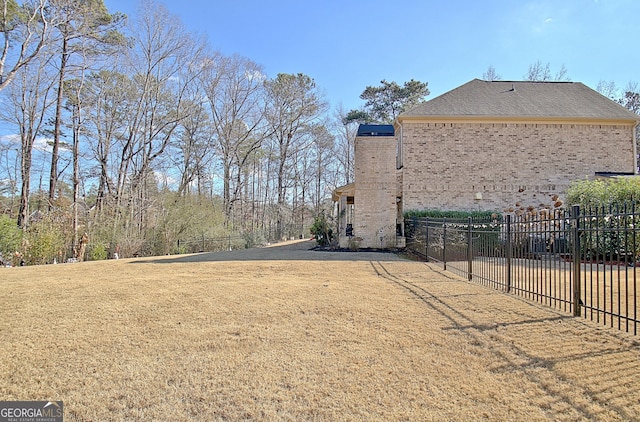 view of yard with fence