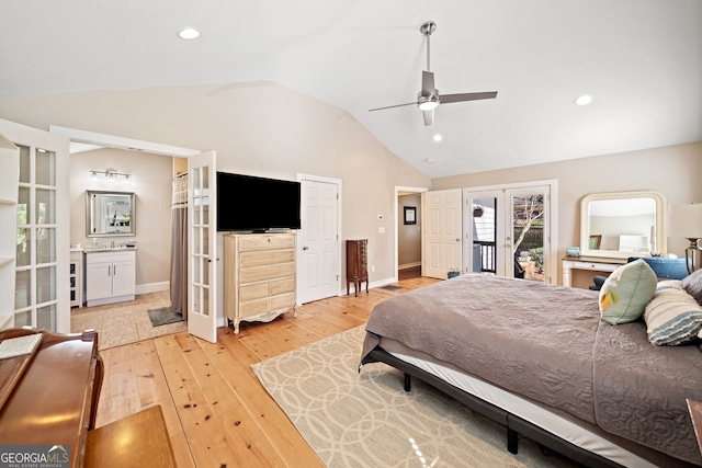 bedroom featuring french doors, recessed lighting, light wood-style floors, vaulted ceiling, and access to outside