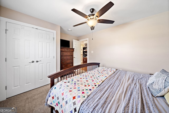 carpeted bedroom with a closet and ceiling fan