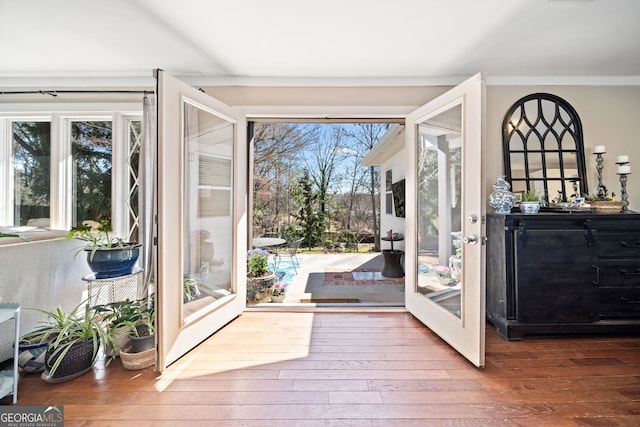 doorway to outside with hardwood / wood-style floors