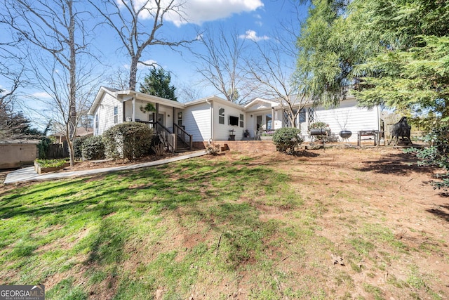 exterior space with a front yard